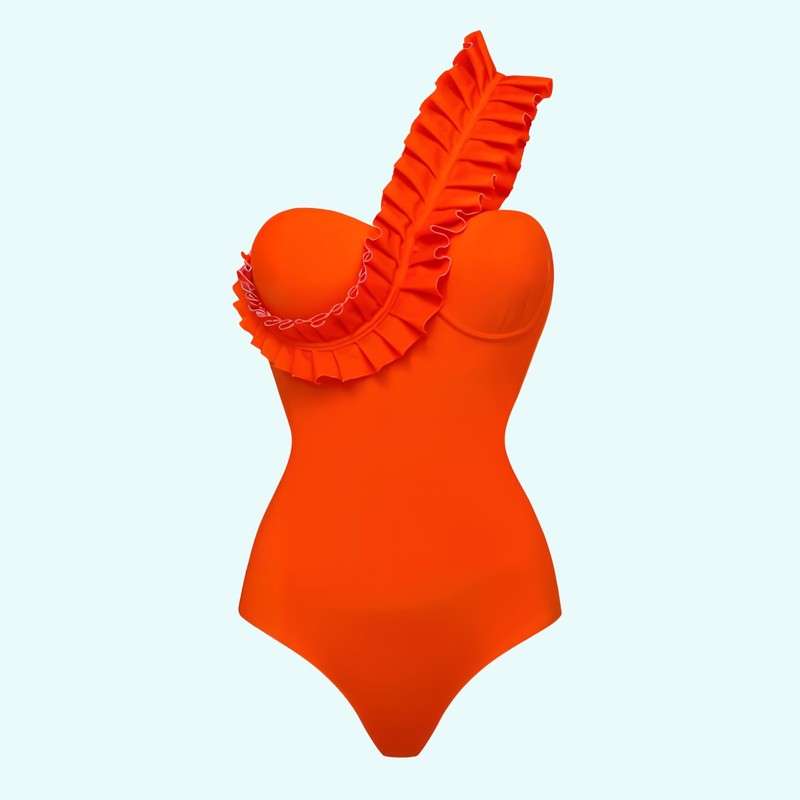 Maiô de uma peça de roupa de banho dobrada com folha de lótus